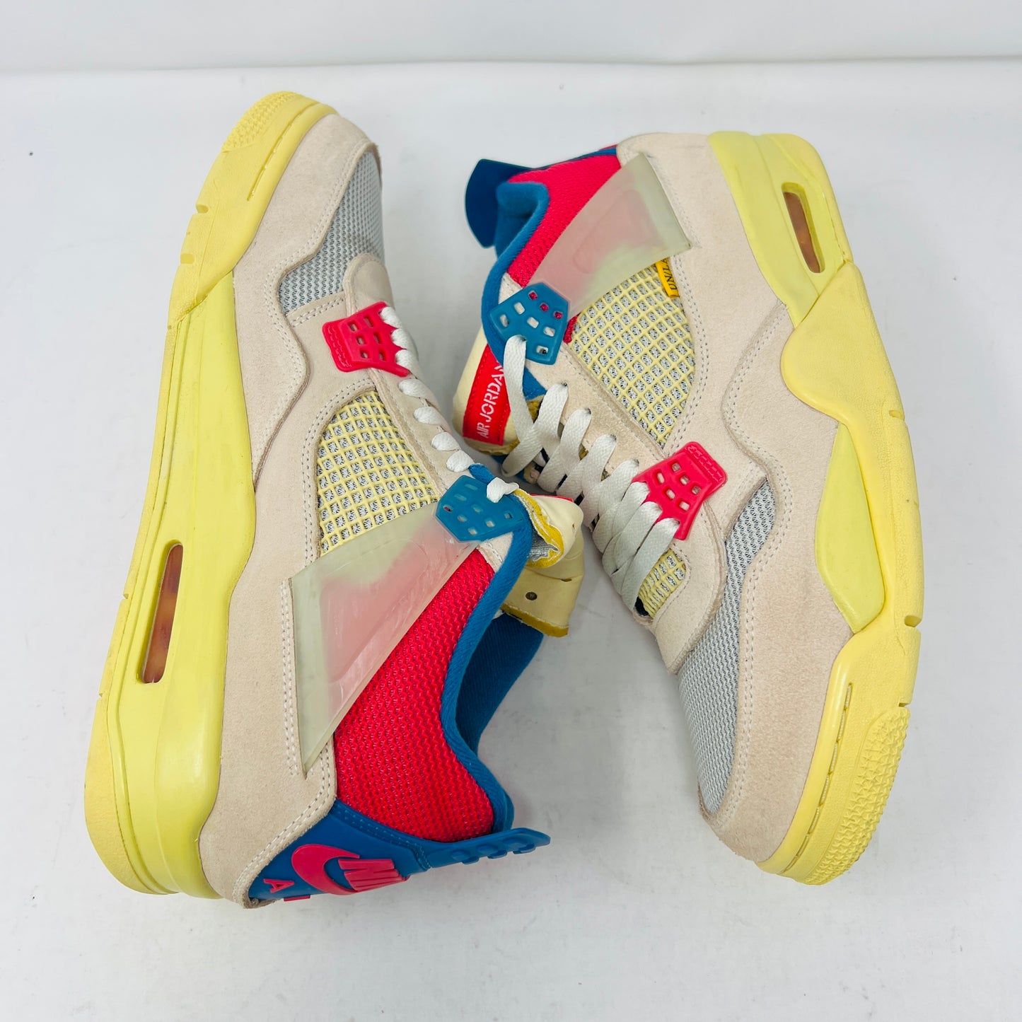 Jordan 4 Retro Union Guava Ice