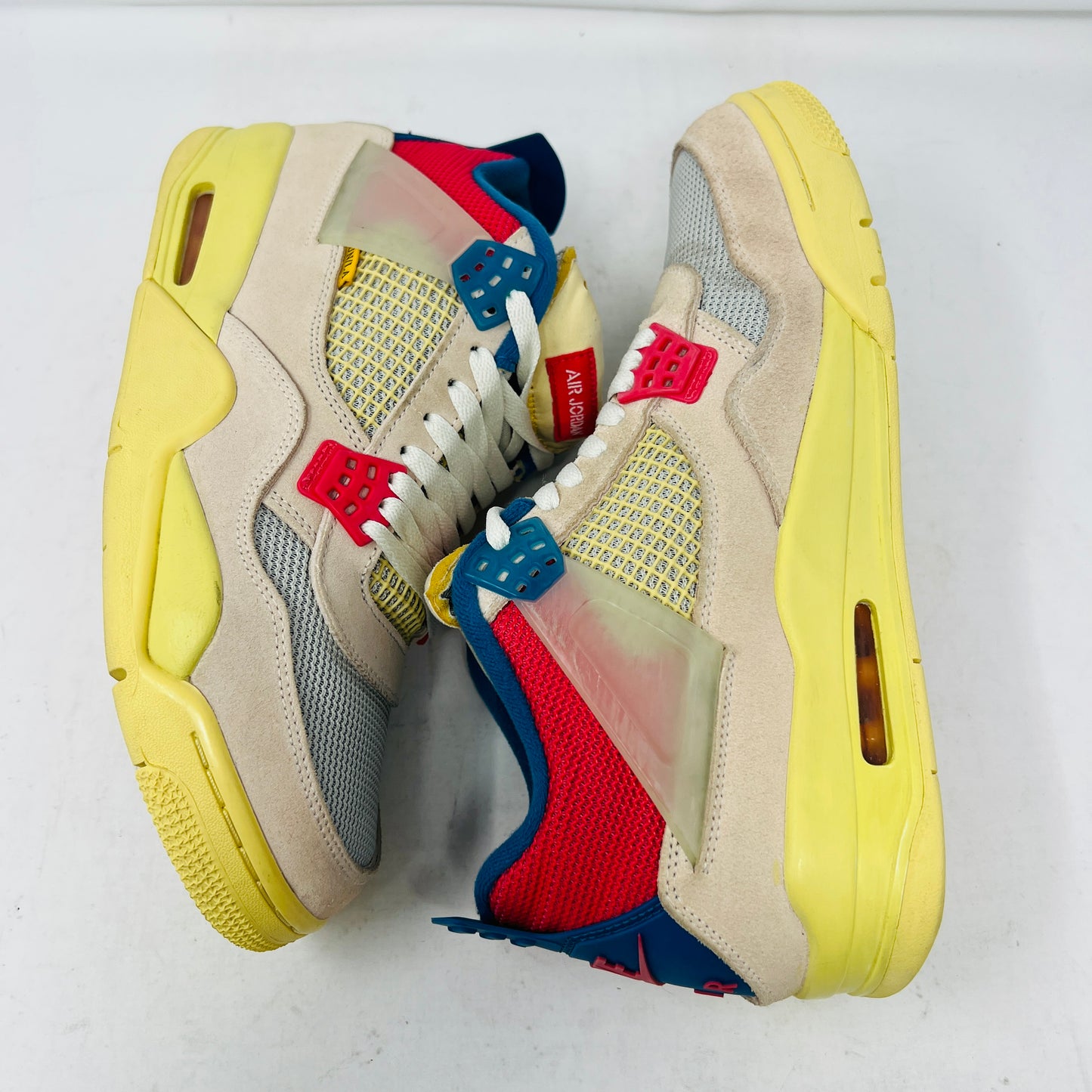 Jordan 4 Retro Union Guava Ice