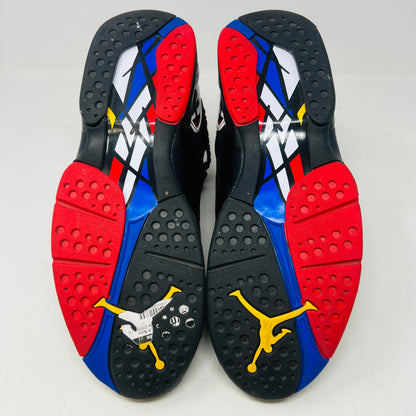 A Jordan 8 Retro Playoffs (2023) shoe, black and red with gray/red accents, features a high-top design with a strap, textured sole with blue hints, and clean uppers. Displayed on its Nike Air box in good condition, the label reveals size and Jordan brand details.