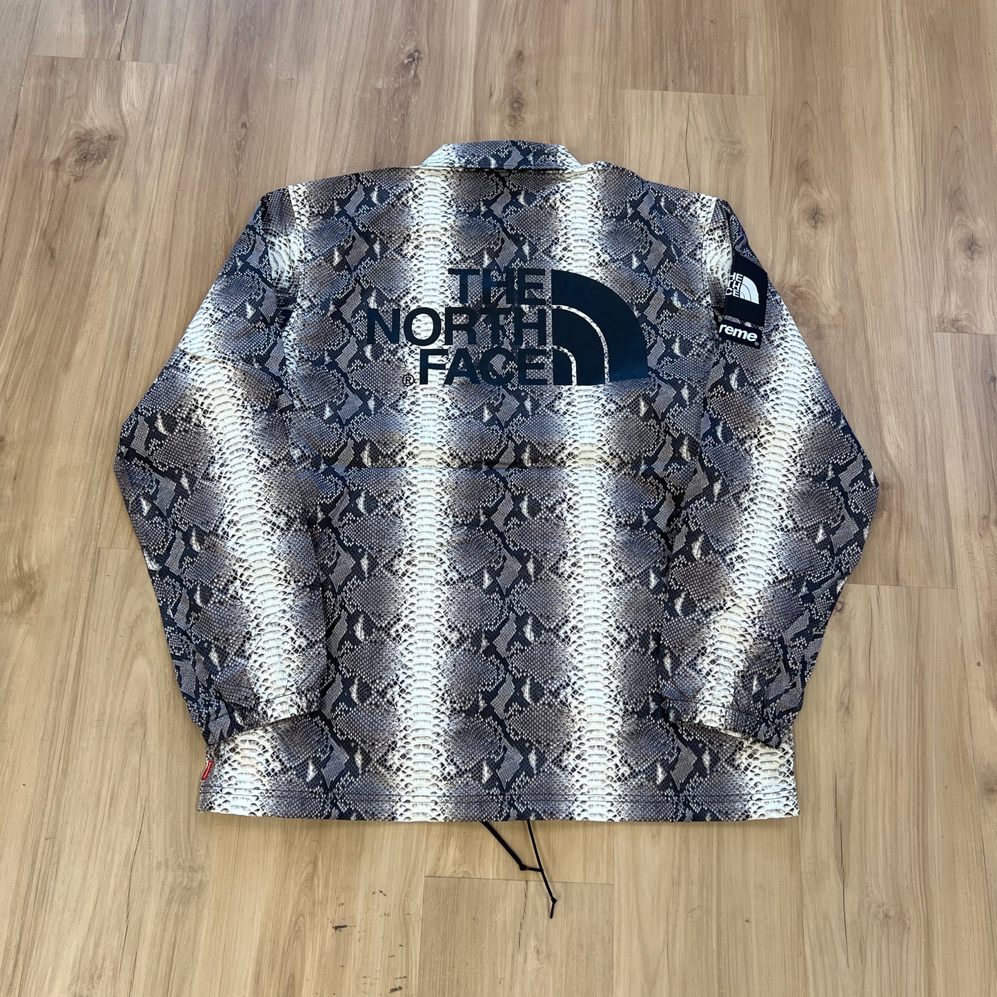 Supreme The North Face Snakeskin Taped Seam Coaches Jacket Black