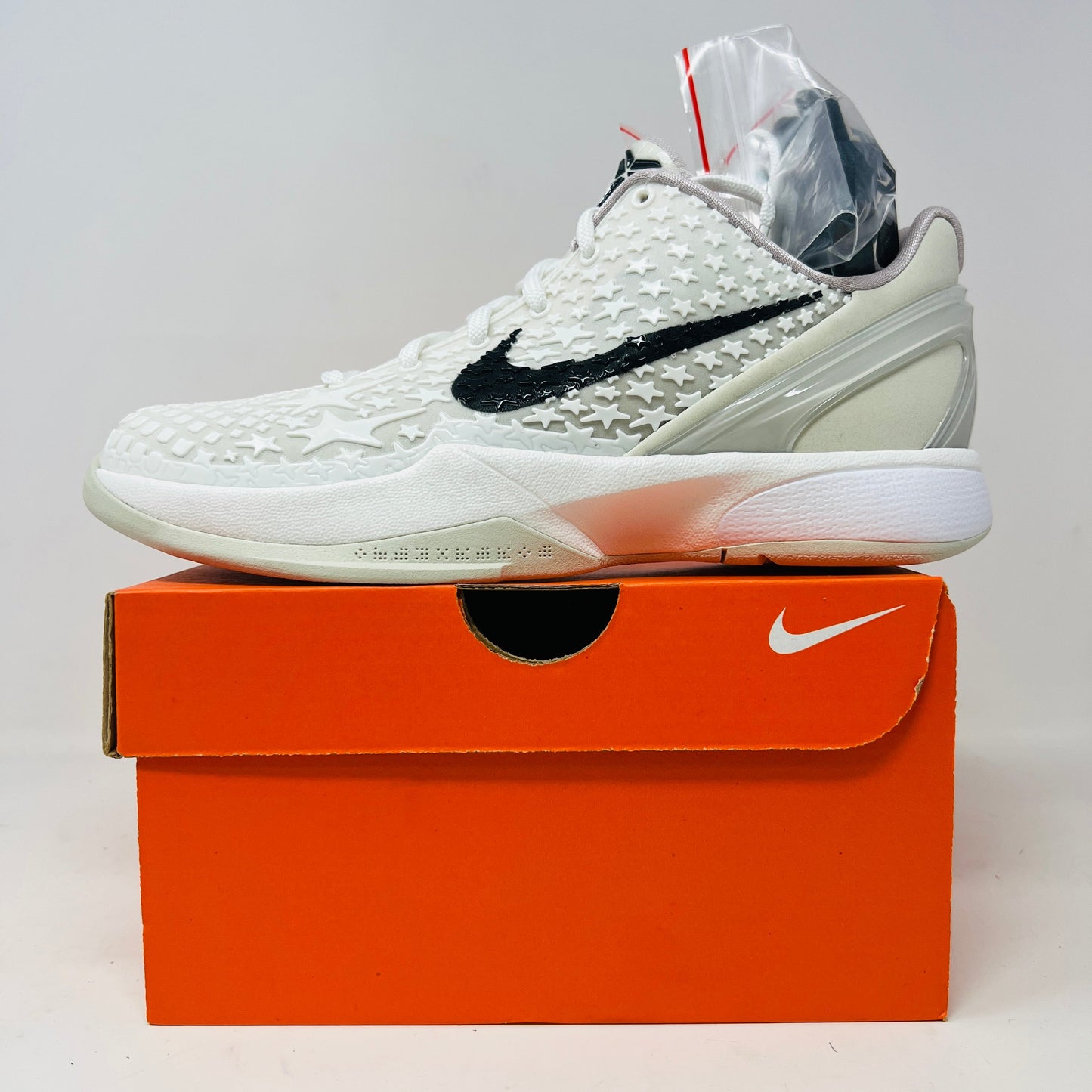 Nike Kobe 6 Sail All-Star GS sneaker with extra laces on orange box, 2024 release.