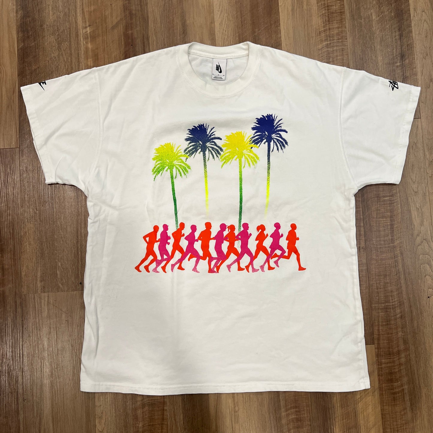 Nike x Stussy Douglas Firs to Palm Trees T-shirt, brand new with colorful palm tree and silhouette design.