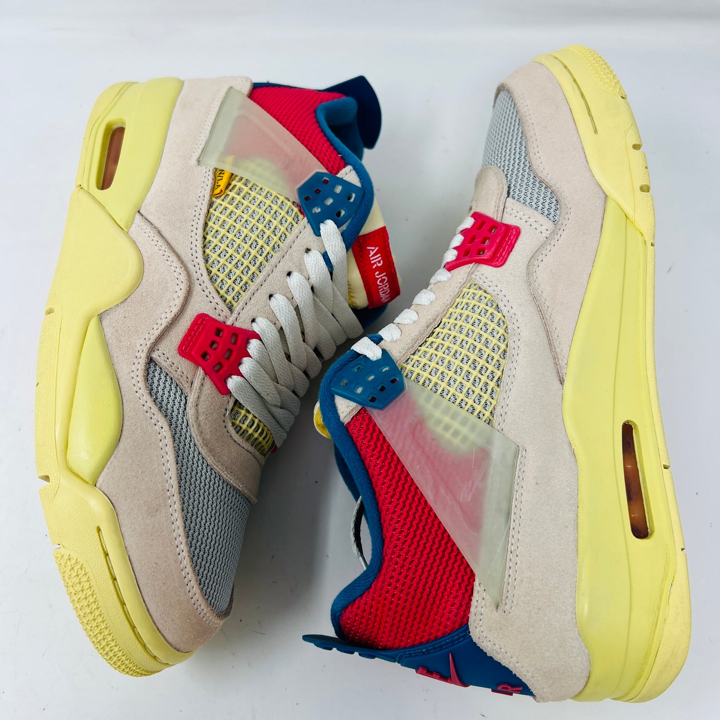 Jordan 4 Retro Union Guava Ice