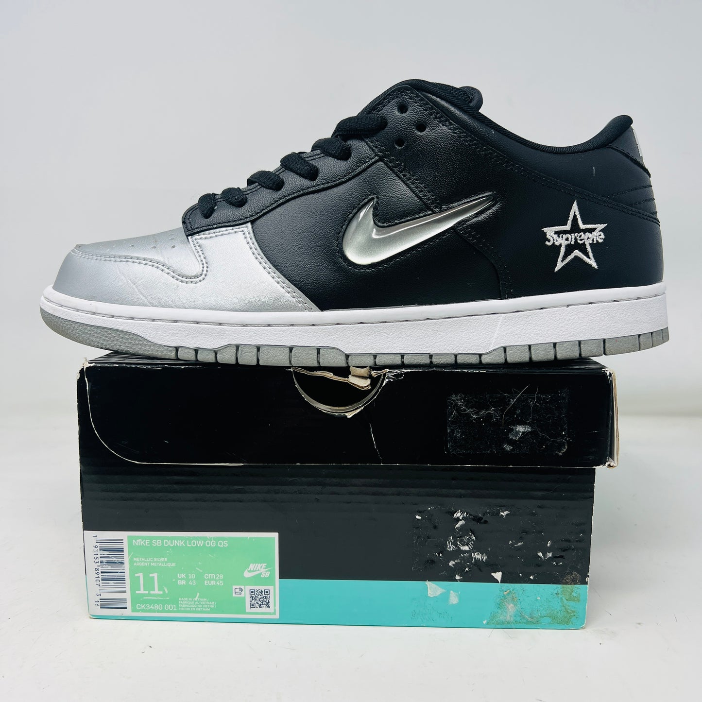 Nike SB Dunk Low Supreme Jewel Swoosh Silver
