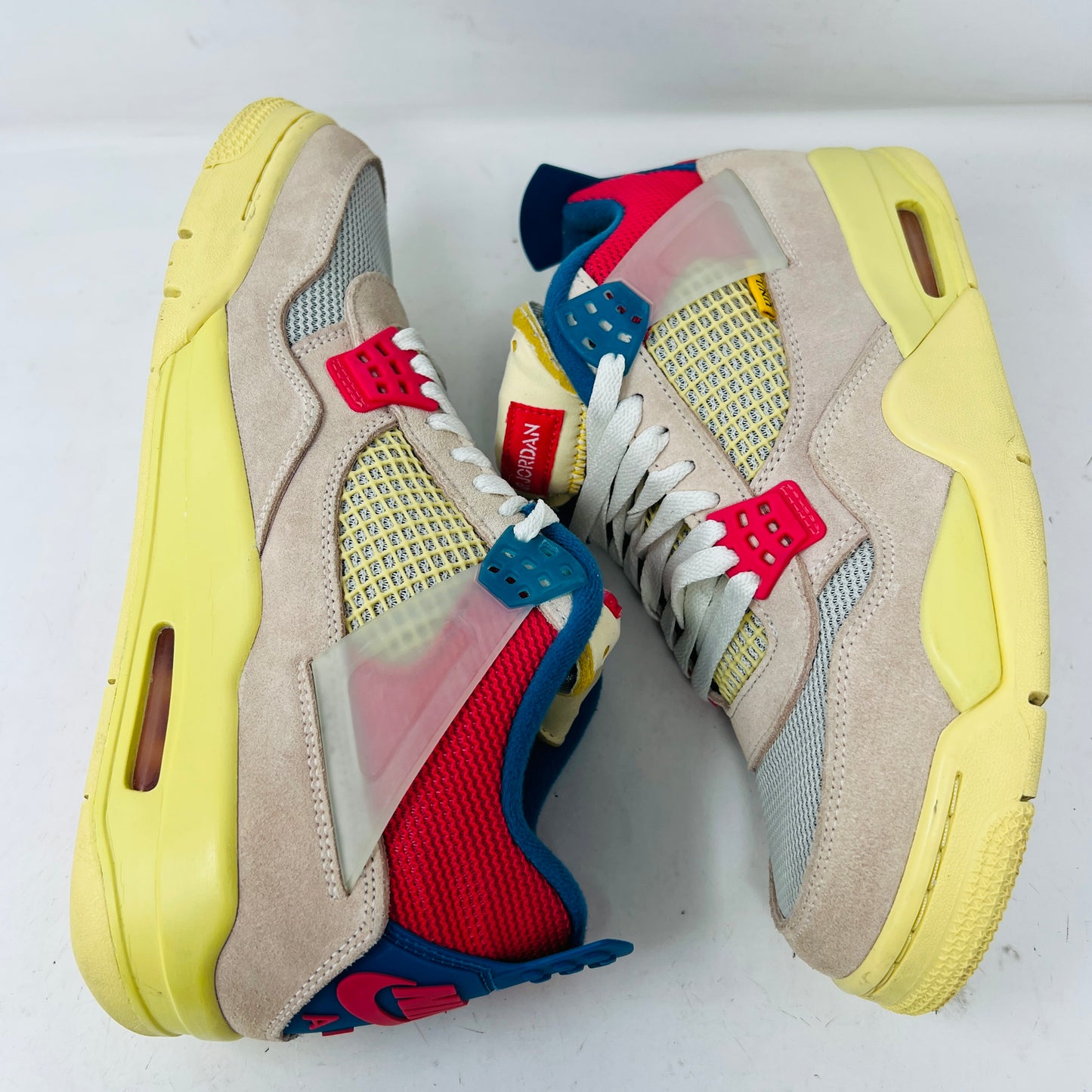 Jordan 4 Retro Union Guava Ice