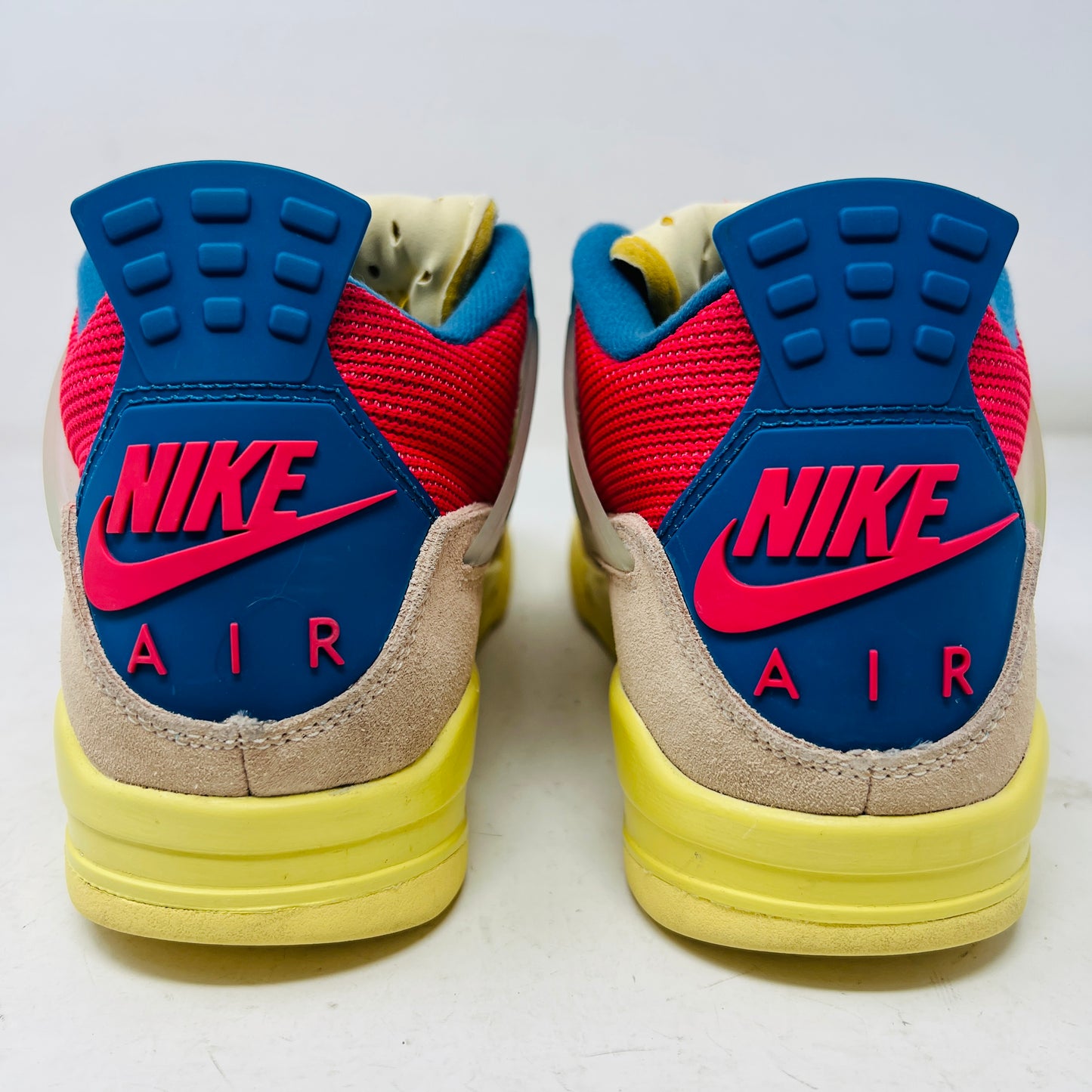 Jordan 4 Retro Union Guava Ice