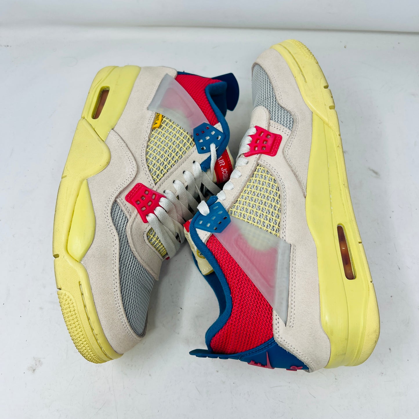 Jordan 4 Retro Union Guava Ice