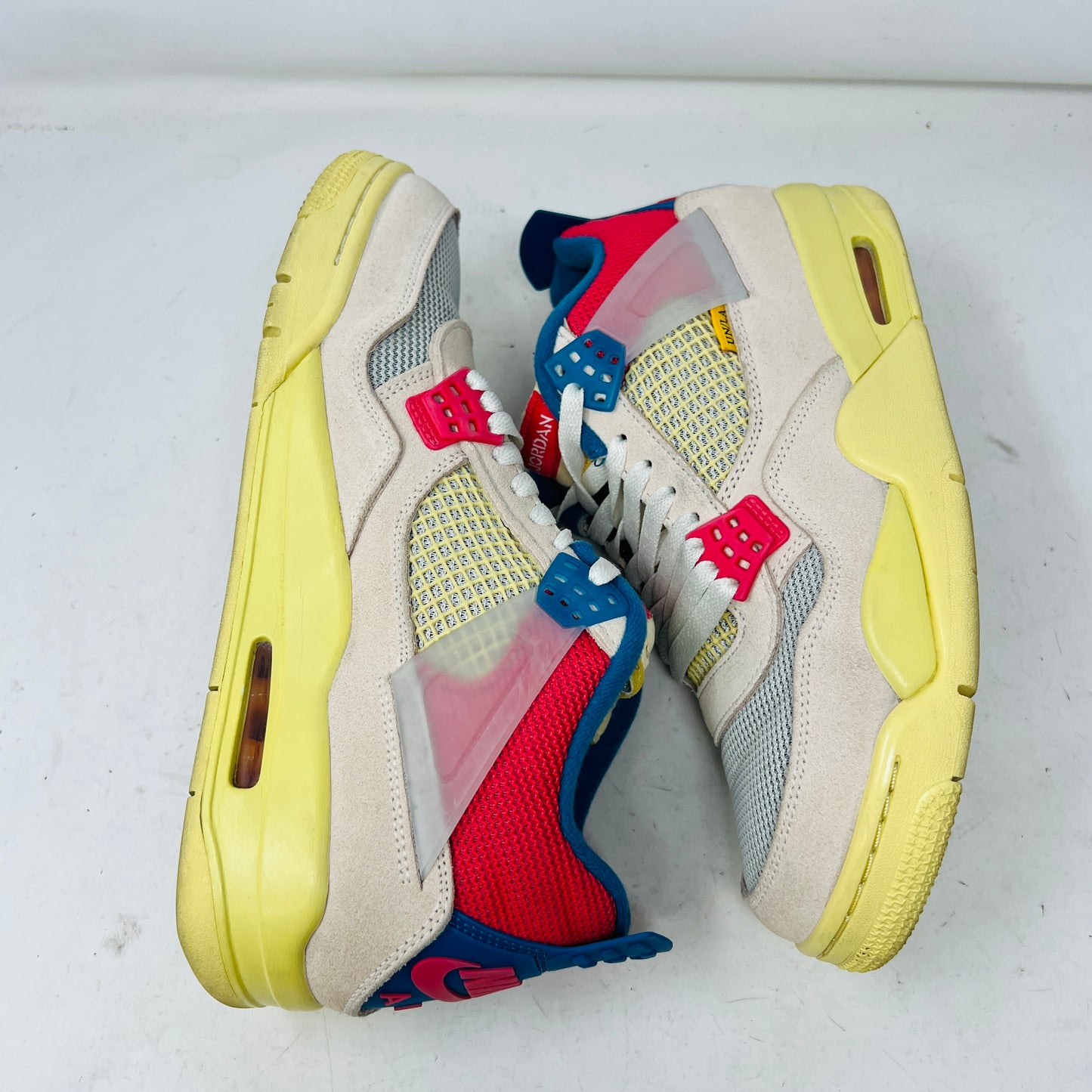 Jordan 4 Retro Union Guava Ice