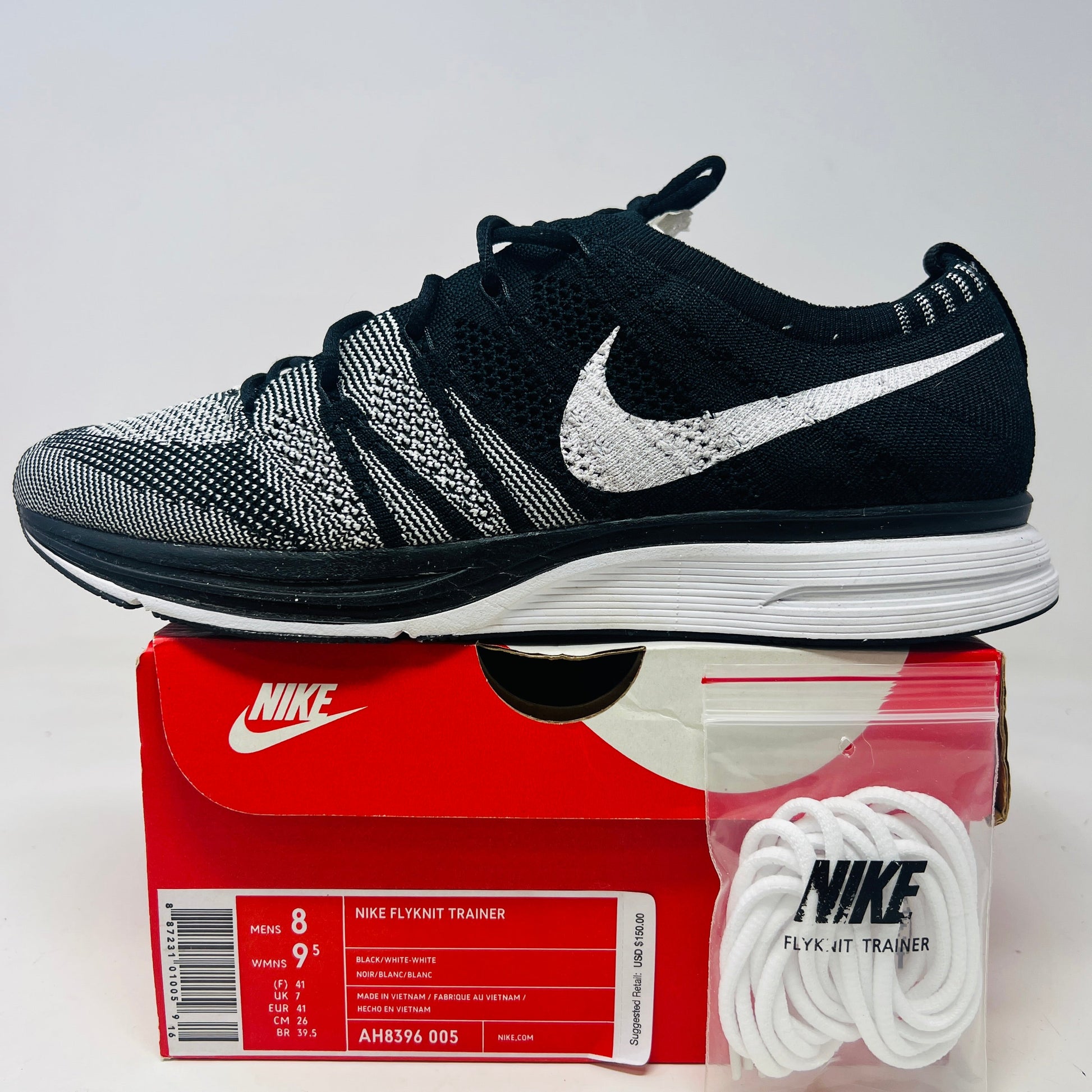 Nike Flyknit Trainer Oreo sneakers with clean uppers, slight wear, extra laces, 2018 edition.