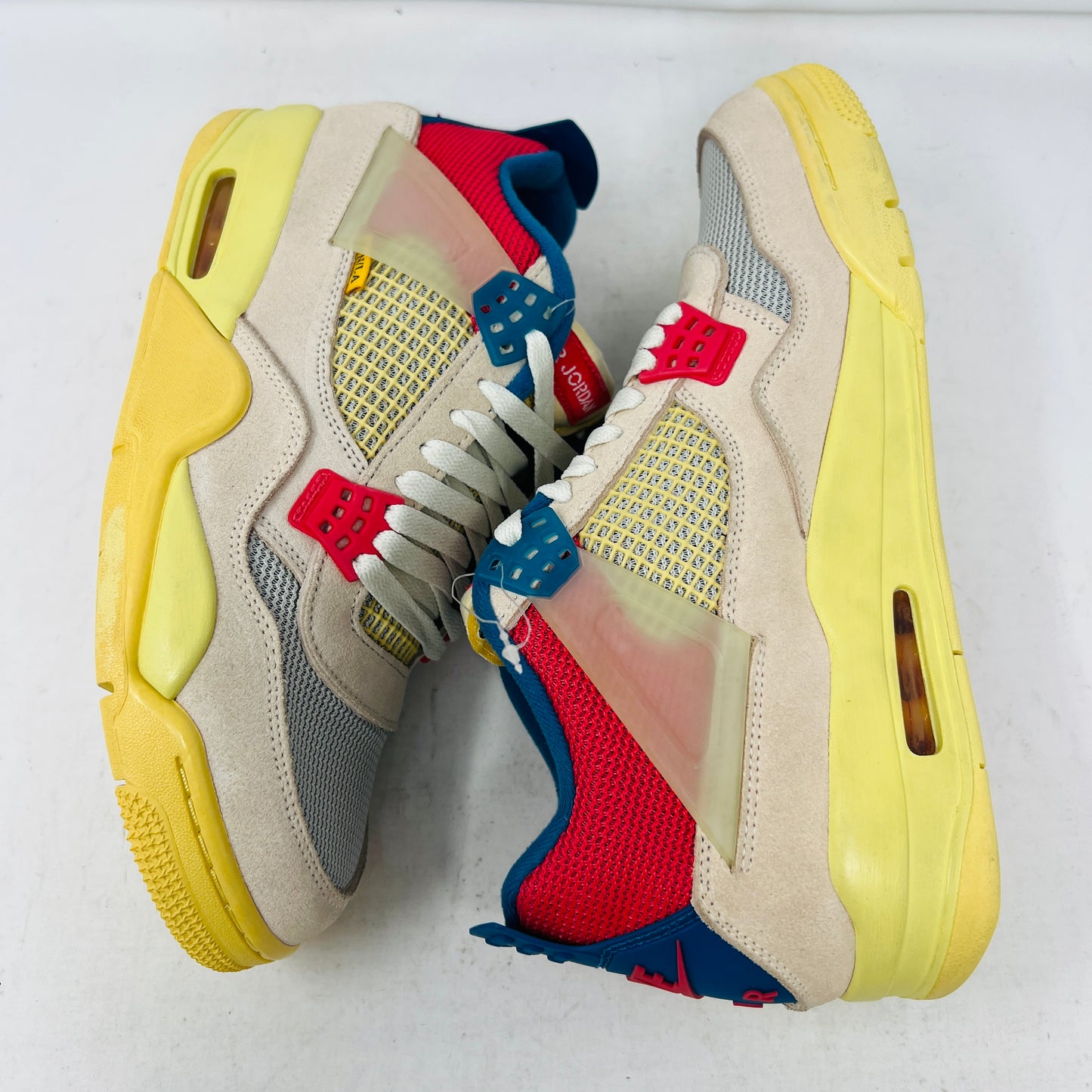 Jordan 4 Retro Union Guava Ice