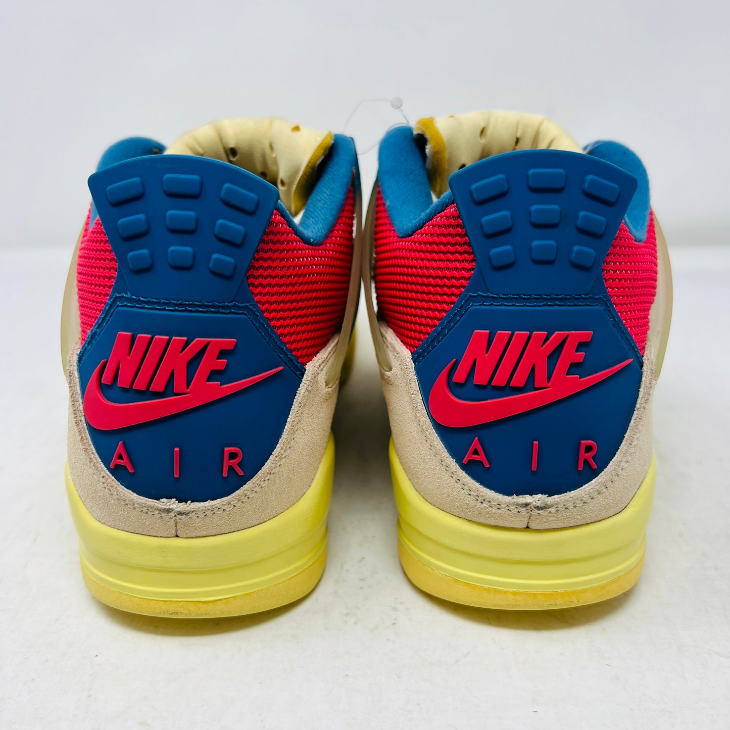 Jordan 4 Retro Union Guava Ice