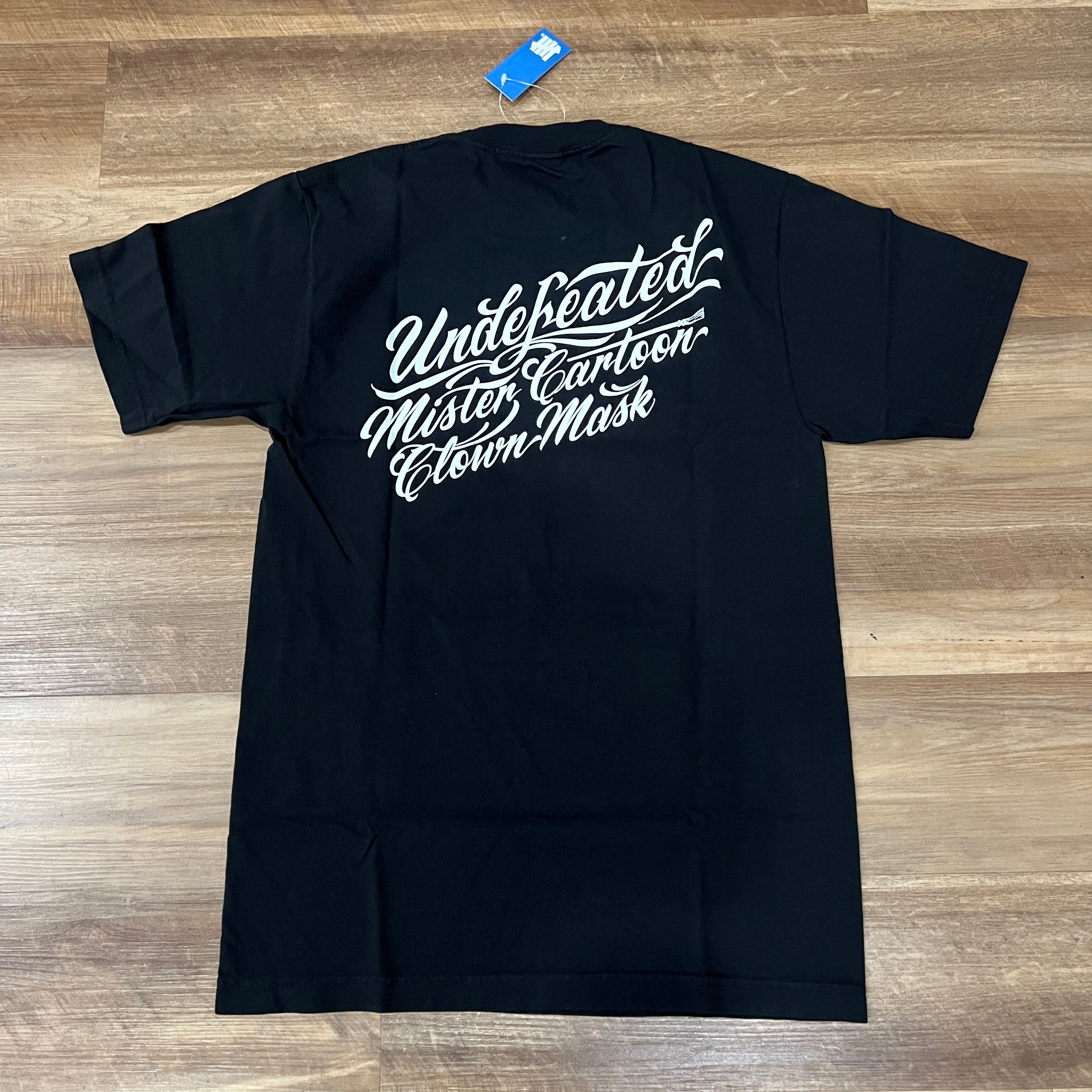 Undefeated x Mister Cartoon S/S Tee Black – Holy Ground