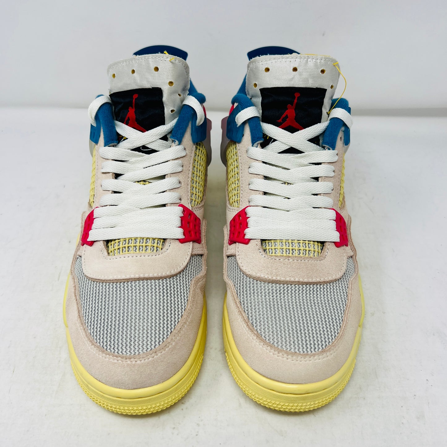 Jordan 4 Retro Union Guava Ice