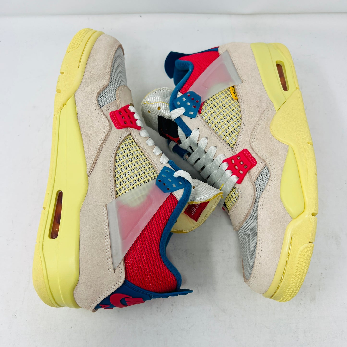 Jordan 4 Retro Union Guava Ice