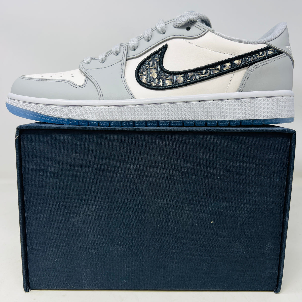 Jordan 1 Retro Low Dior – Holy Ground