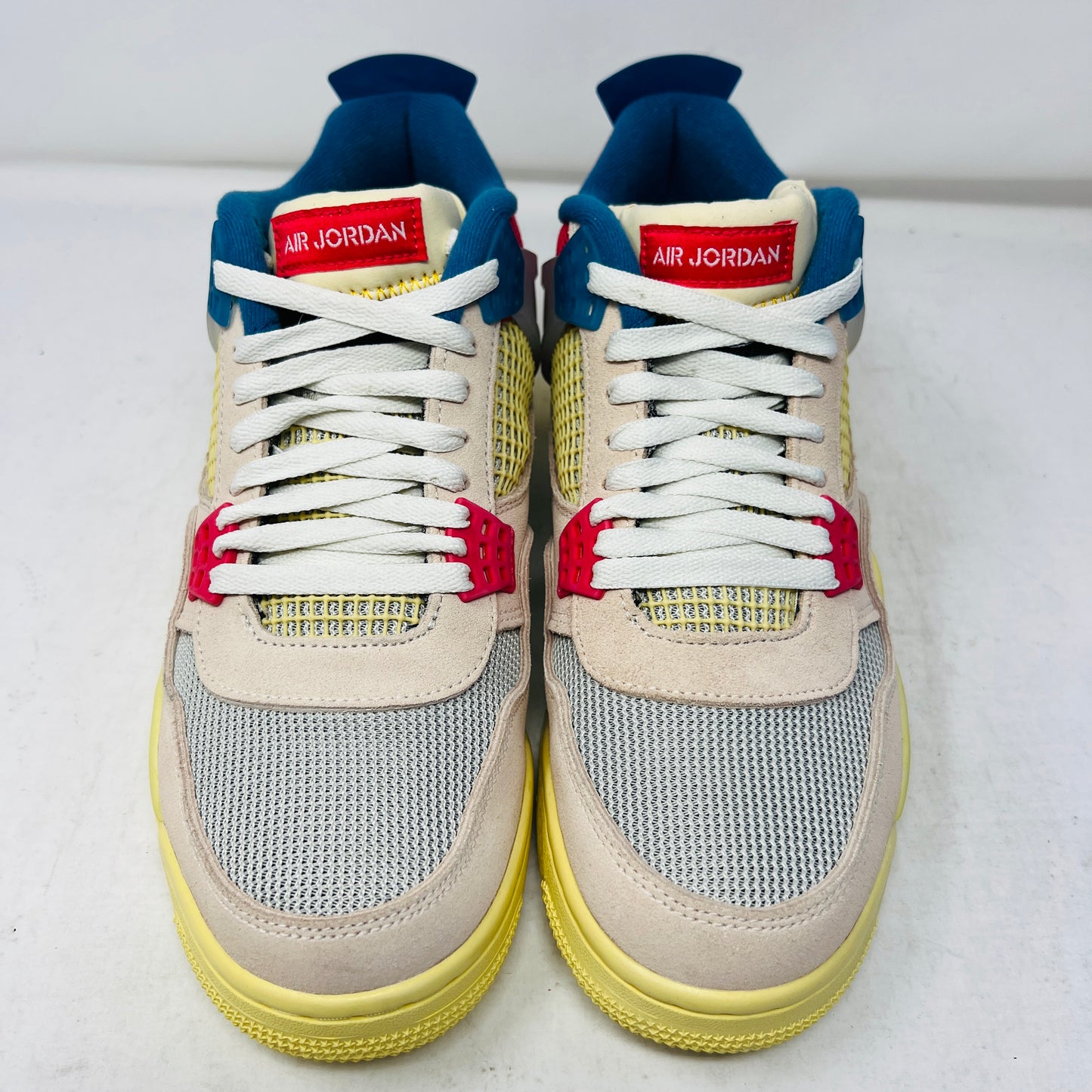 Jordan 4 Retro Union Guava Ice