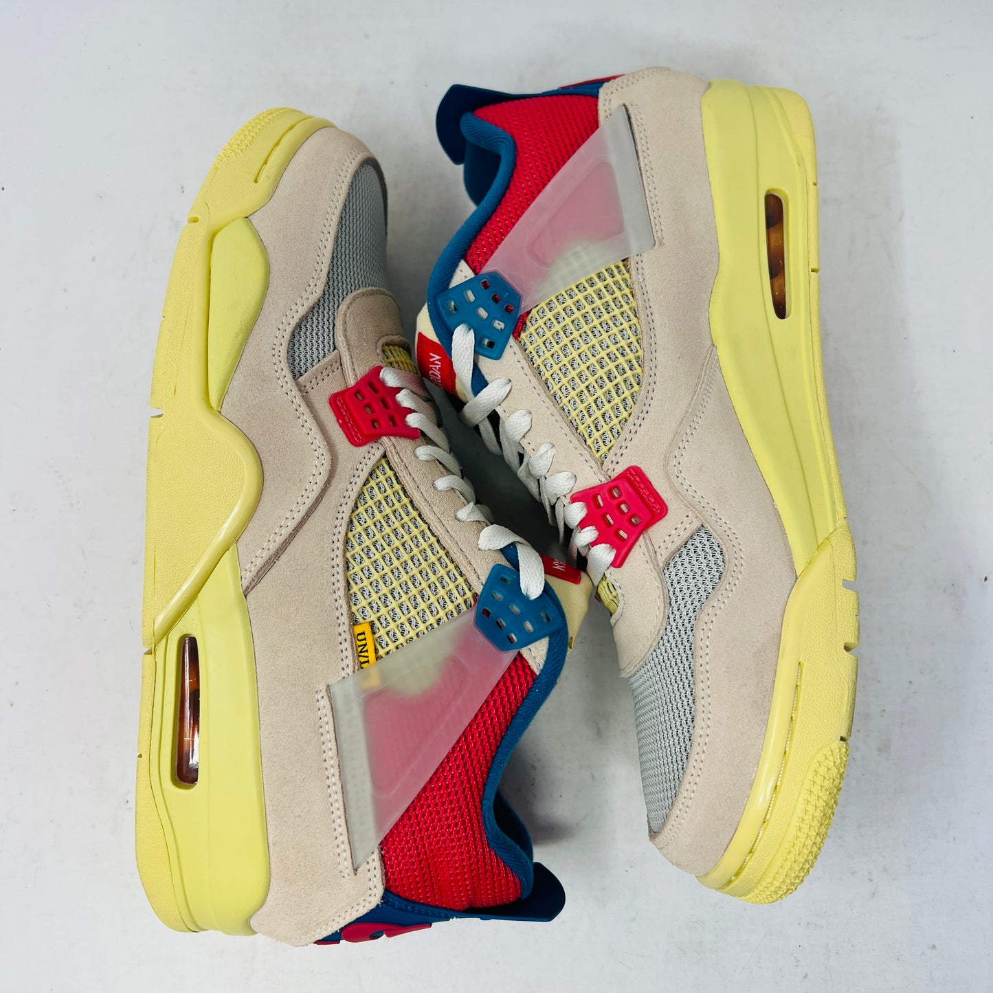Jordan 4 Retro Union Guava Ice