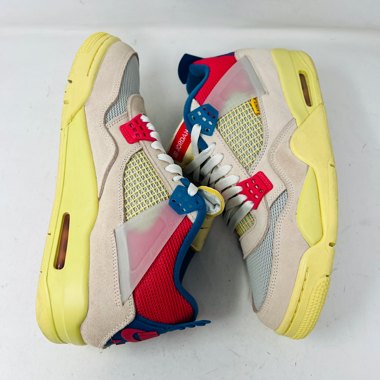 Jordan 4 Retro Union Guava Ice