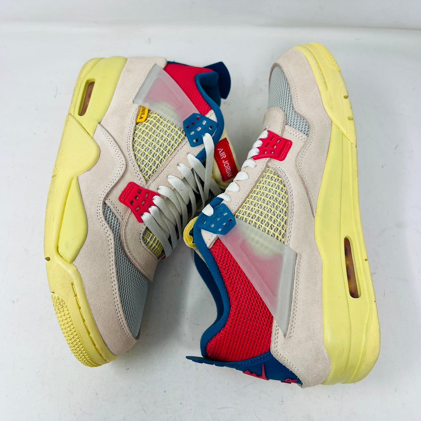 Jordan 4 Retro Union Guava Ice