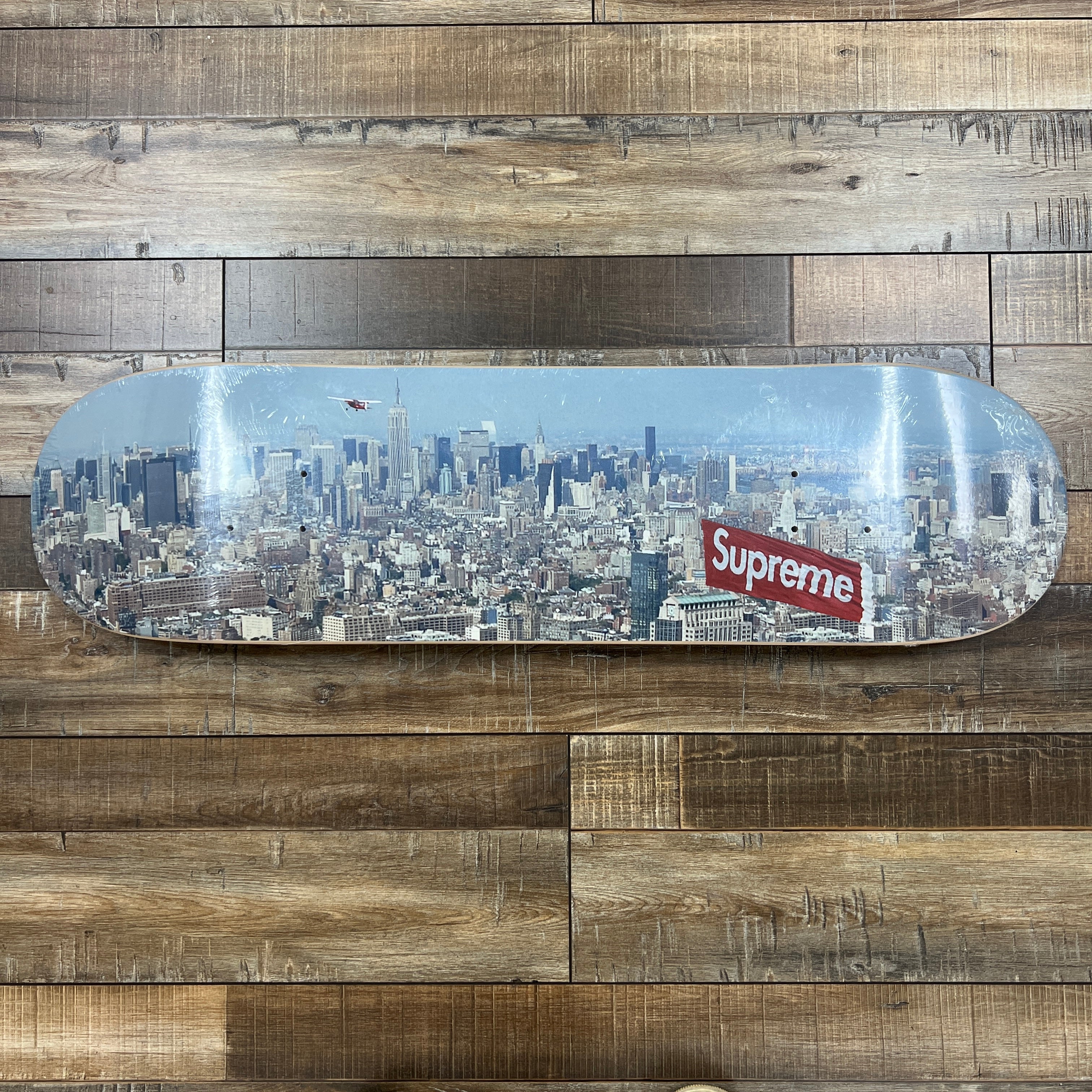 Supreme Aerial Skateboard Deck – Holy Ground