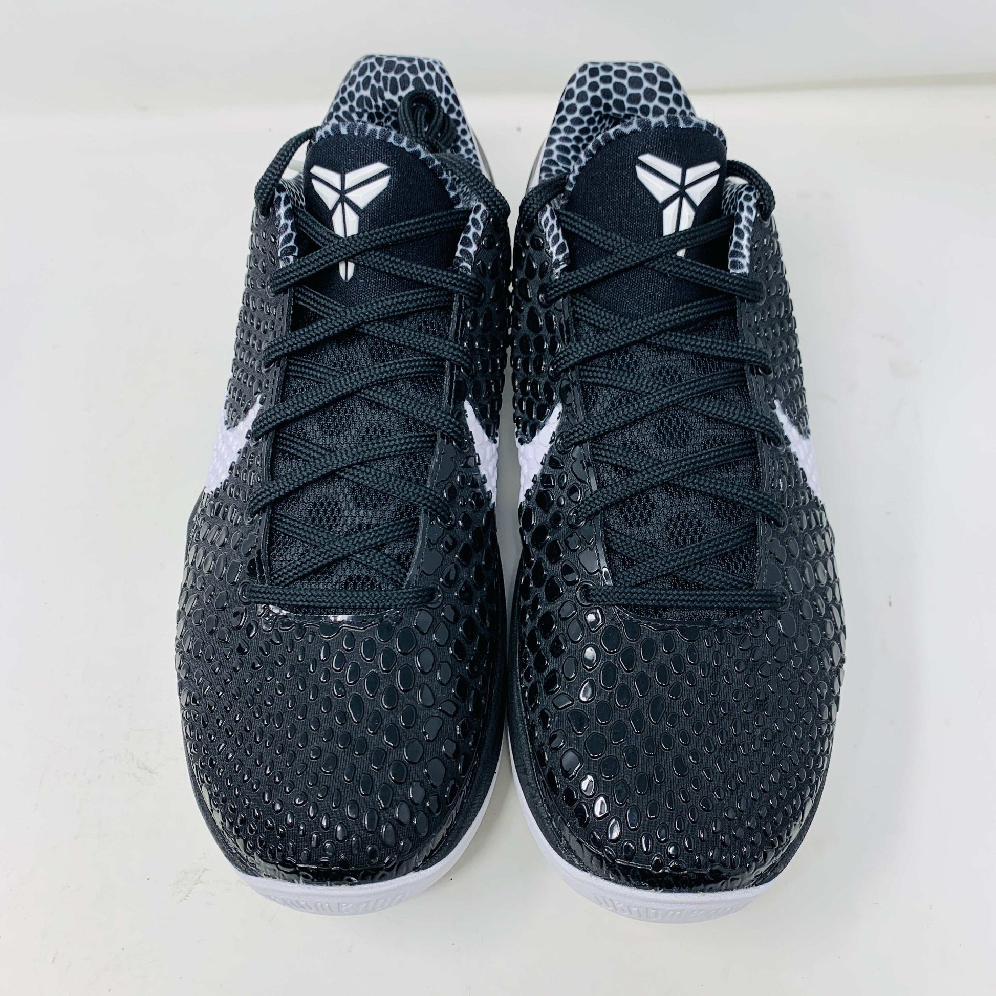 Nike Kobe 6 Protro Mambacita Sweet 16 sneakers, black with white accents, displayed upright.