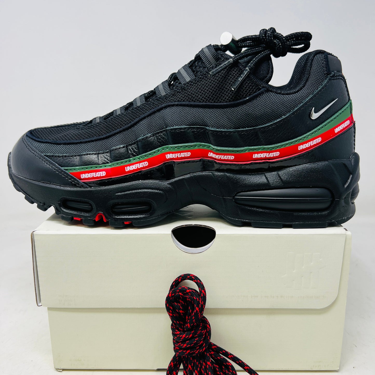 Nike Air Max 95 SP Undefeated Black sneaker on box with extra laces and dust bag 2025 model