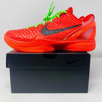Nike Kobe 6 Protro Reverse Grinch red sneakers on black box, green laces, 2023 release.