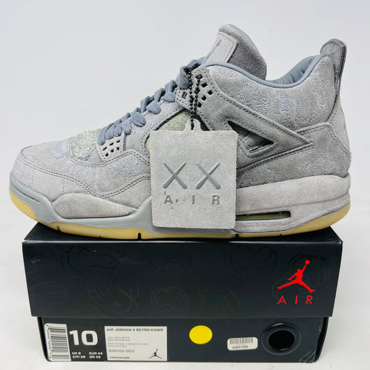 Jordan 4 Retro Kaws gray suede sneakers with hang tag on black box, size 10, 2017 edition