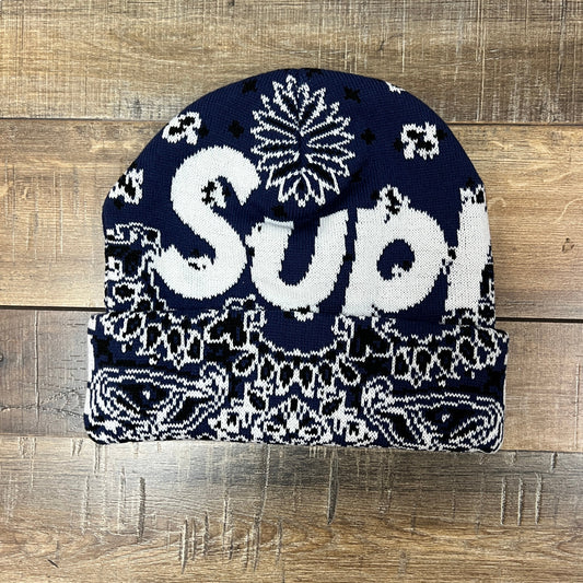 Blue Supreme Big Logo Bandana Beanie on wooden background