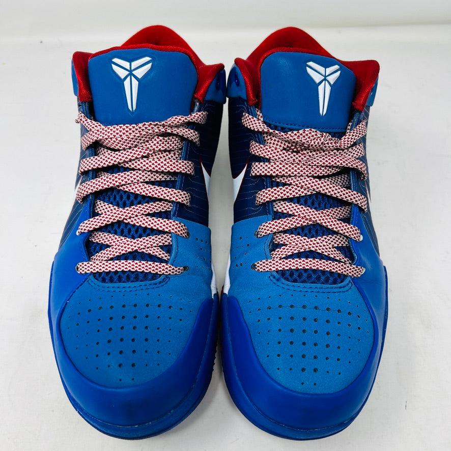 A Nike Kobe 4 Protro Philly (2024) sneaker, blue with red accents and a white swoosh, sits on a black Nike box in excellent condition. Perfect for general wear, it features pinstripes and ZOOMAIR on a white sole. The box shows size and model details.