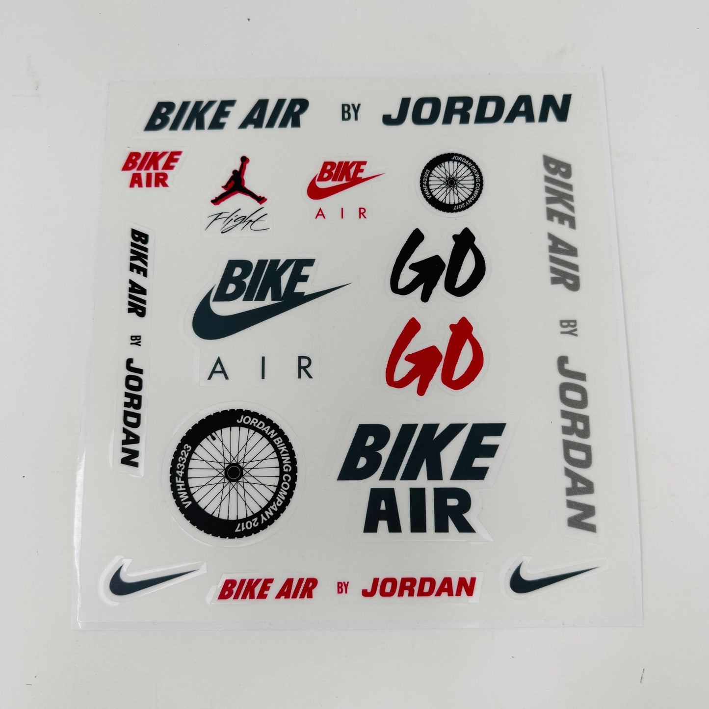 The Jordan 4 RM SP Nigel Sylvester Grandmas Driveway sneakers feature a dark green color with Air by Jordan on the tongue in white, accented with white laces and a low-top design, all set against a plain white background.