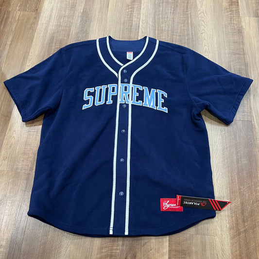 Navy Supreme fleece baseball jersey, short sleeve, brand new condition.