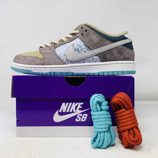 Nike SB Dunk Low Big Money Savings sneakers with blue and orange laces, 2024 edition.
