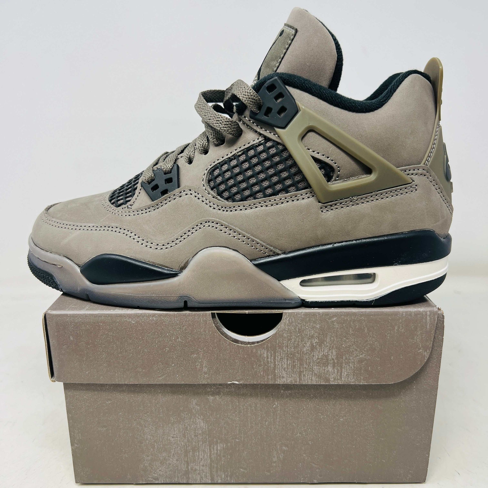 Jordan 4 Retro OG Cave Stone GS sneaker in brand new condition on box background