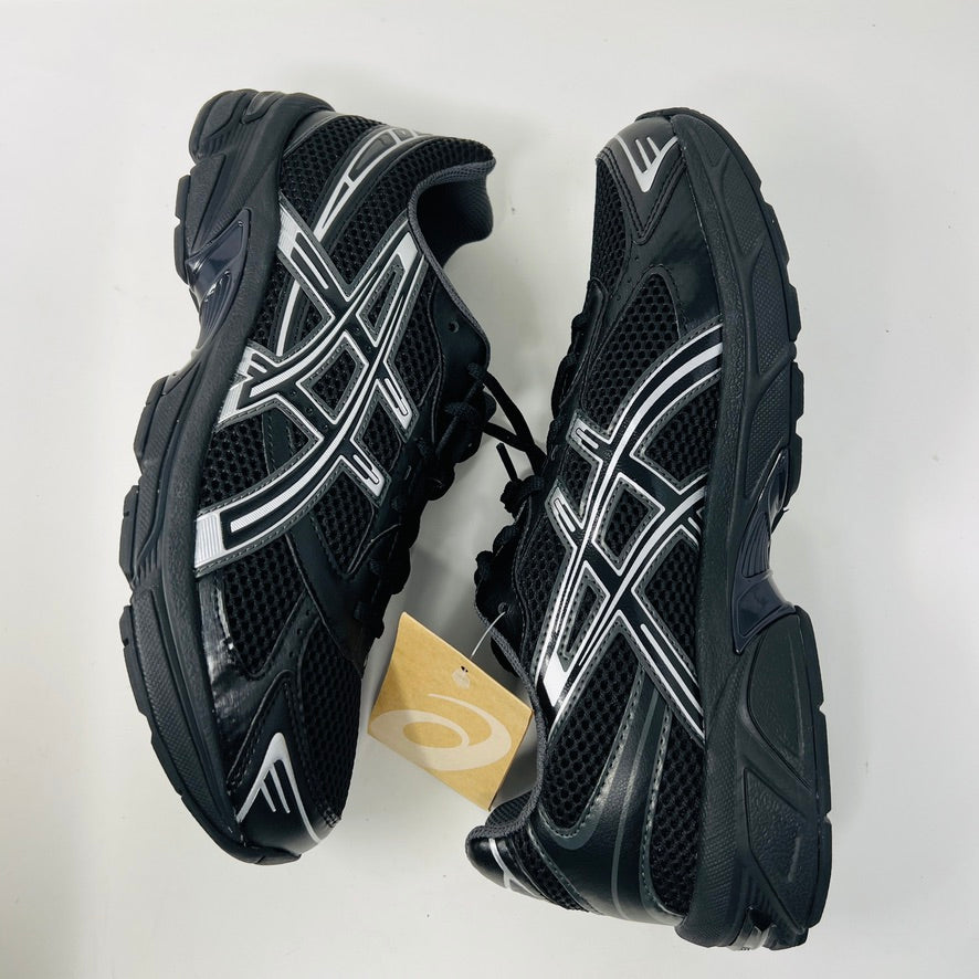 ASICS Gel-1130 Black Pure Silver sneaker on box, 2023 model.