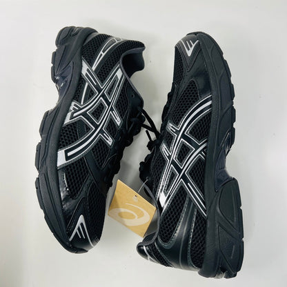 ASICS Gel-1130 Black Pure Silver sneaker on box, 2023 model.