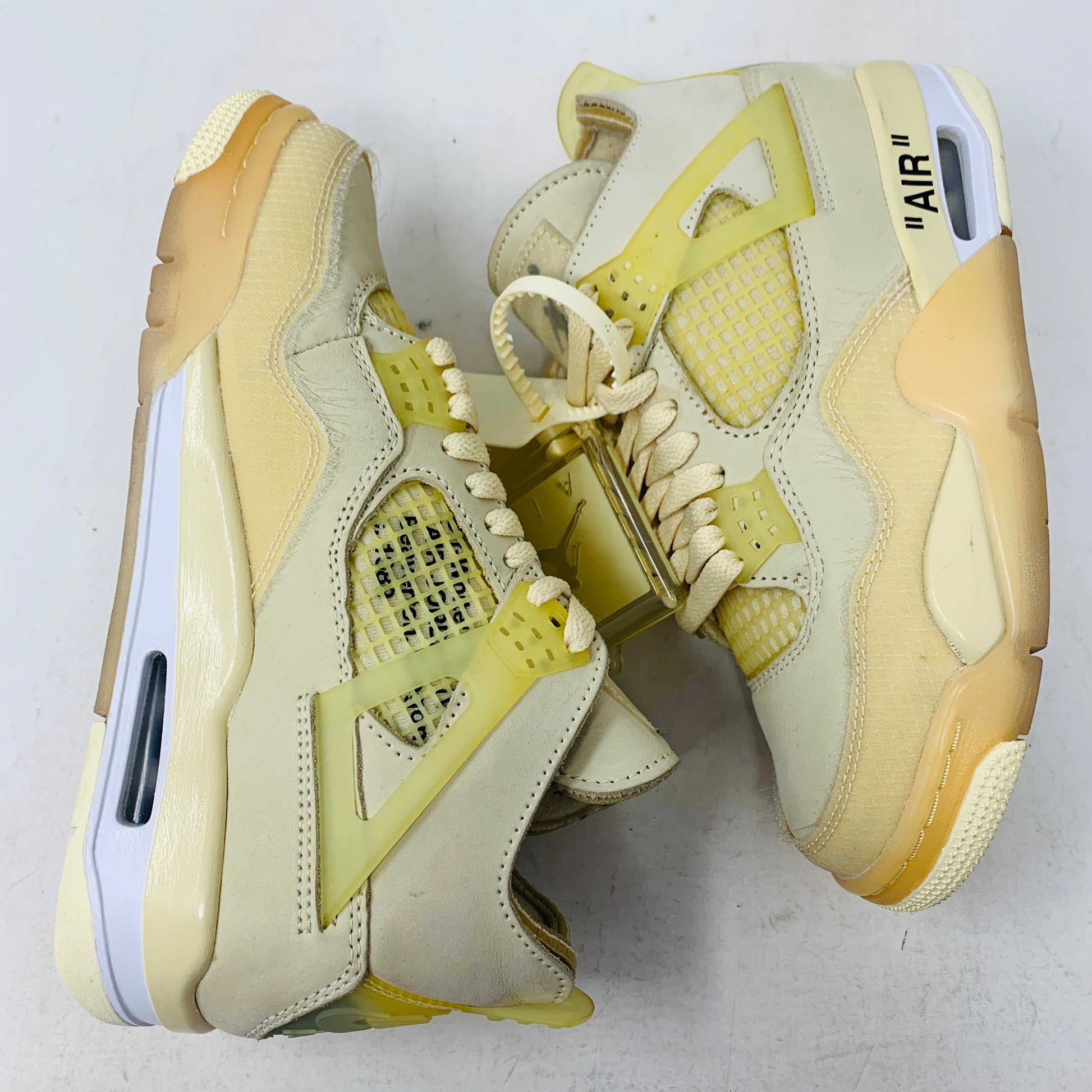 Women's Jordan 4 Retro Off-White Sail sneakers, size 5.5W/4M, with original accessories, 2020 model.