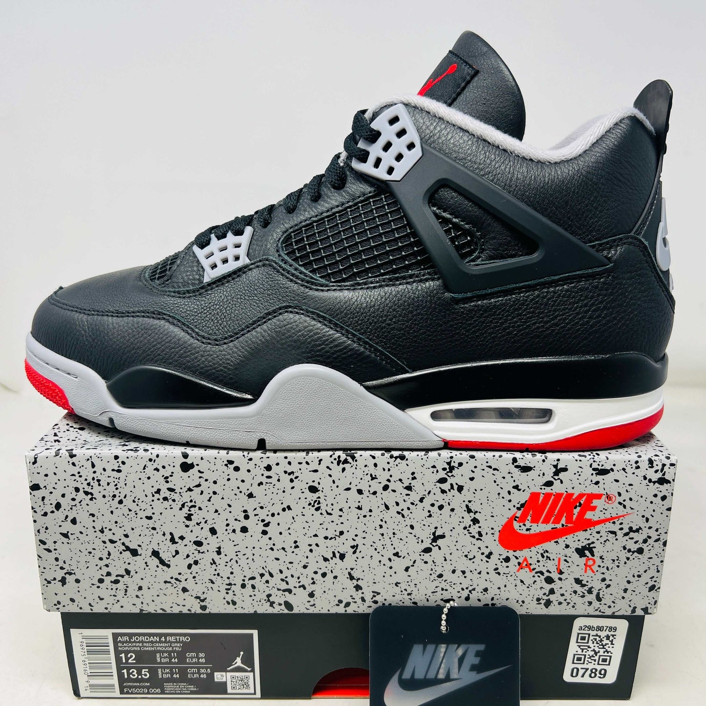 Jordan 4 Retro Bred Reimagined sneaker in black and red with clean uppers and original box accessories 2024 edition