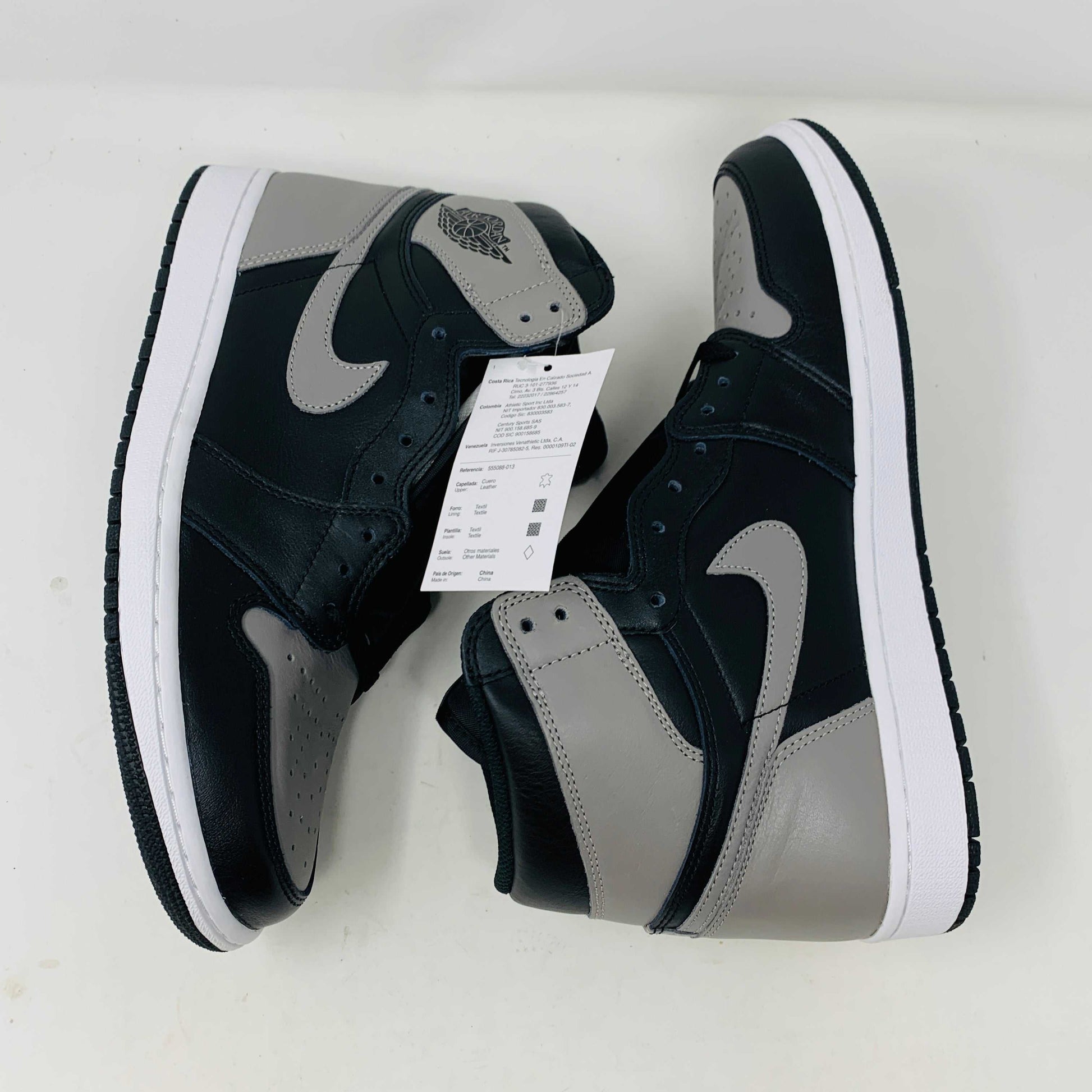 Jordan 1 Shadow 2018 sneakers with grey laces on a Nike box. Brand new condition.