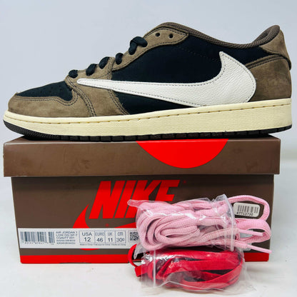 Jordan 1 Retro Low OG Travis Scott Mocha sneaker with extra laces on Nike box