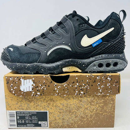 Nike Air Terra Humara Undefeated Black sneaker on branded box with speckled sole and white swoosh logo