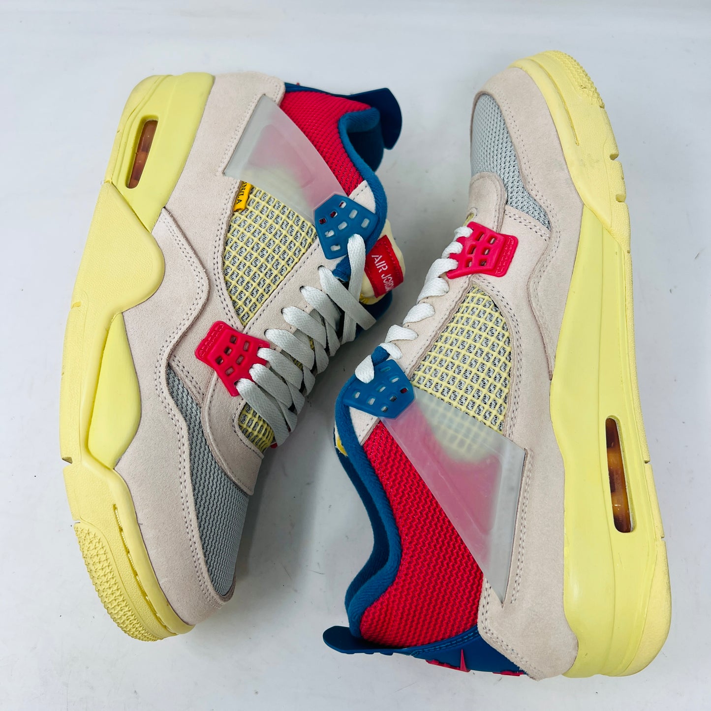 Jordan 4 Retro Union Guava Ice