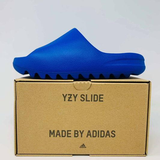 Yeezy Slide Azure 2023 in vibrant blue on Adidas box.