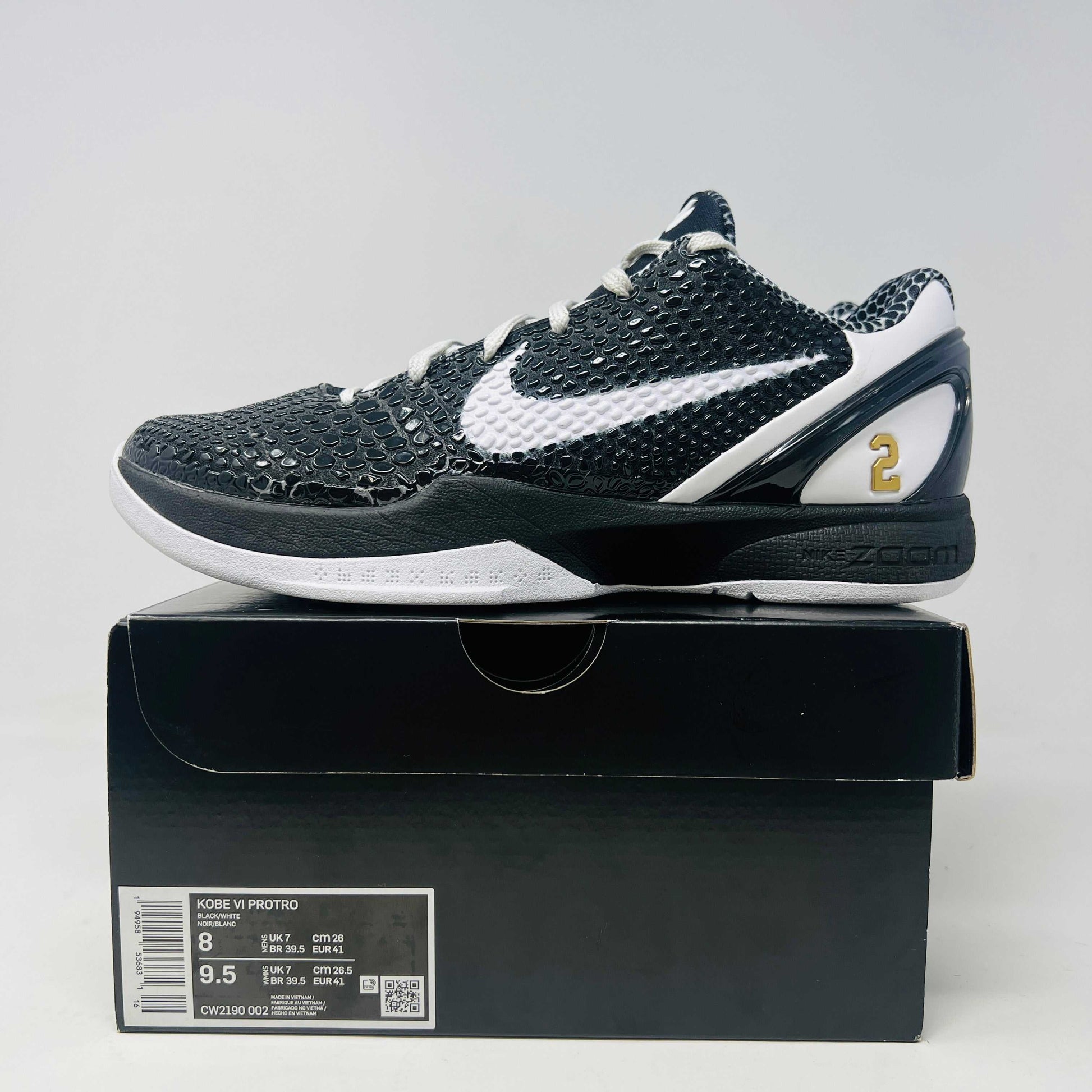Nike Kobe 6 Protro Mambacita Sweet 16 sneakers with light wear and scratch on back tab, shown on box.