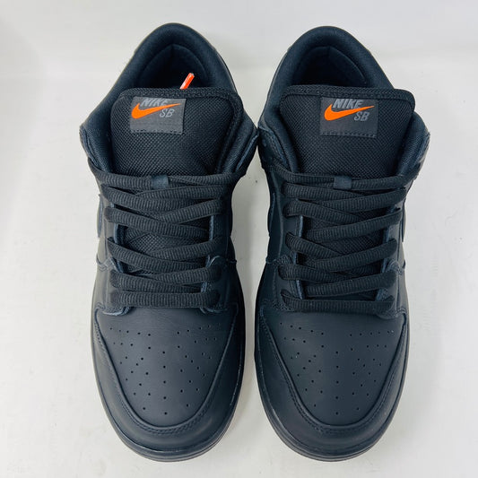 The Nike SB Dunk Low Pro Triple Black sneaker, size 12, is displayed on its original box with extra black laces. This VNDS edition hints at a fresh 2024 style.