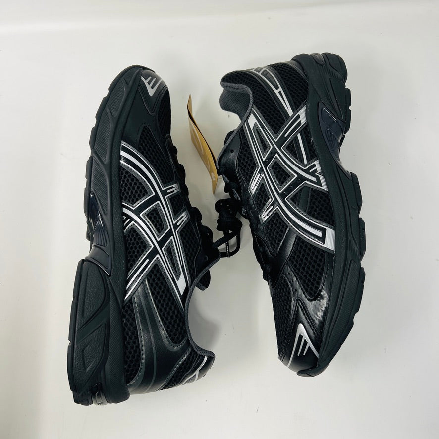 ASICS Gel-1130 Black Pure Silver sneaker on box, 2023 model.