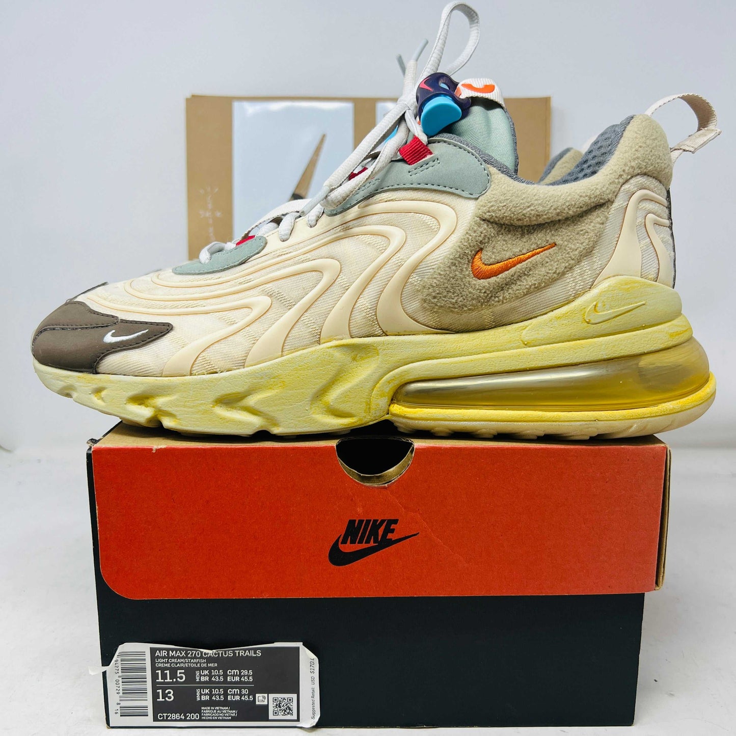Nike Air Max 270 React ENG Travis Scott Cactus Trails sneaker on Nike box with clean uppers and yellow air sole unit