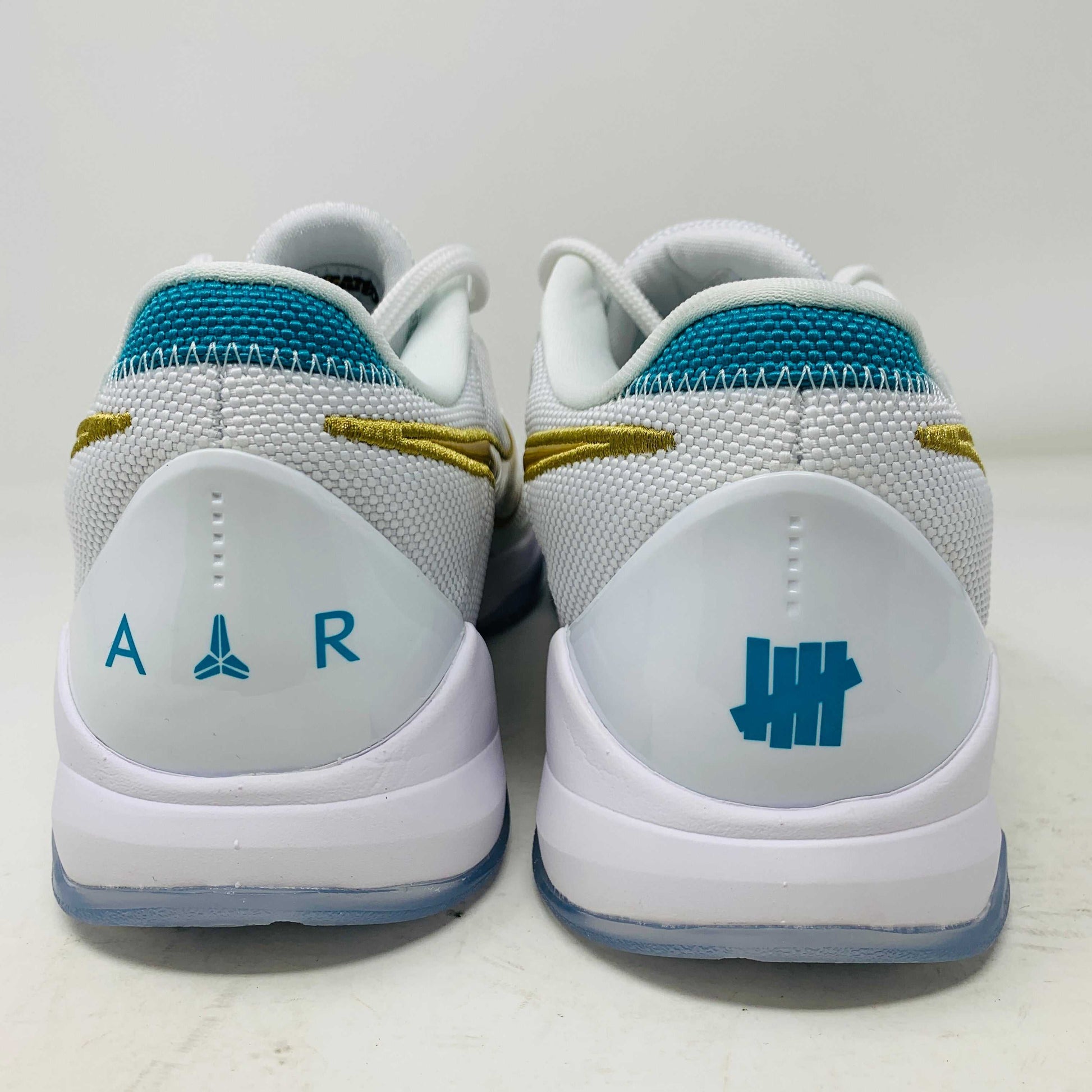 Kobe V Protro Undefeated Pack sneakers with exclusive colorways featuring premium materials and Protro technology.