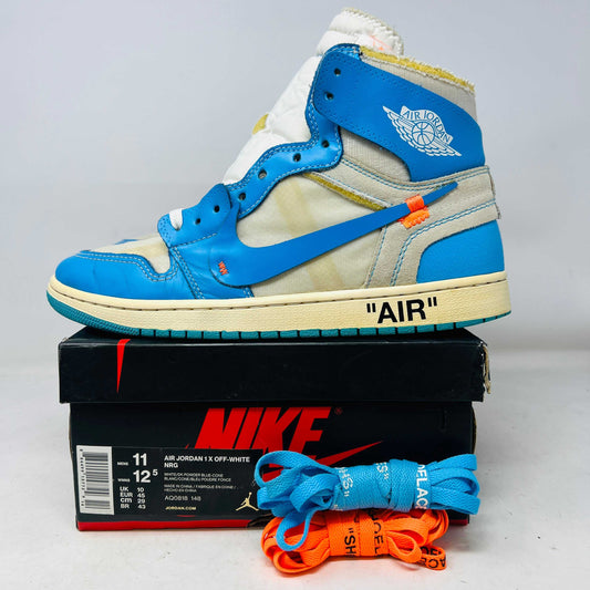 Jordan 1 Retro High Off-White University Blue sneaker with extra laces and zip tie on Nike box