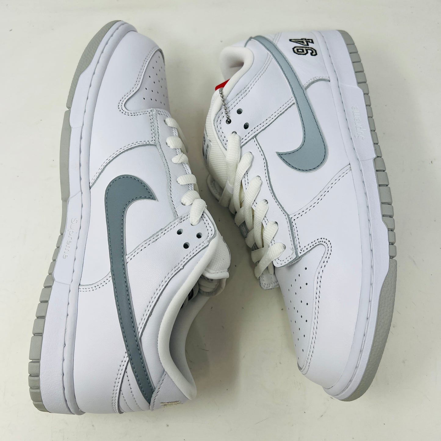 Nike SB Dunk Low Supreme 94 White Metallic Silver
